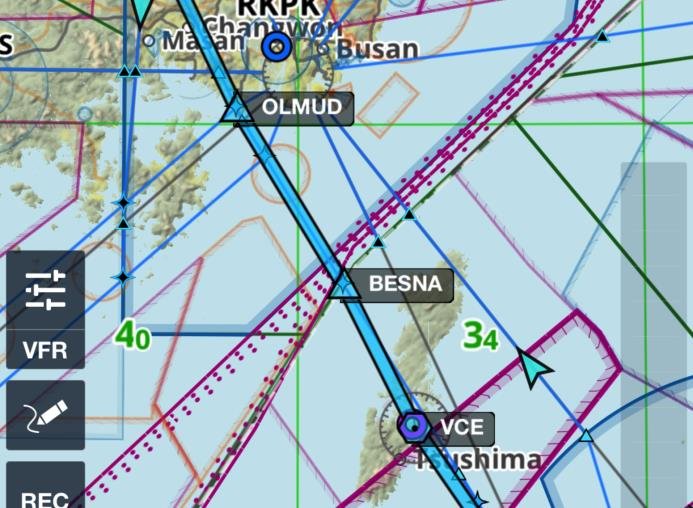 Aeronautical chart showing the route from the Busan area south-east through waypoints OLMUD and BESNA to Tsushima (VCE).